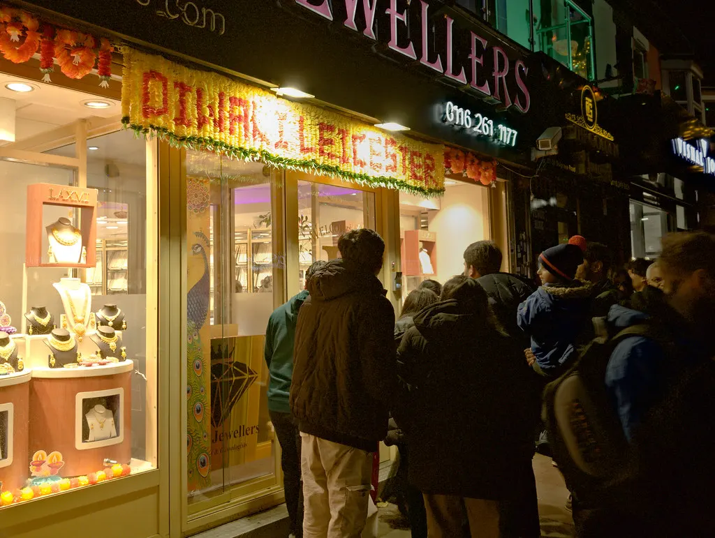 A jewelry shop decorated with diyas during Dhanteras celebrations.