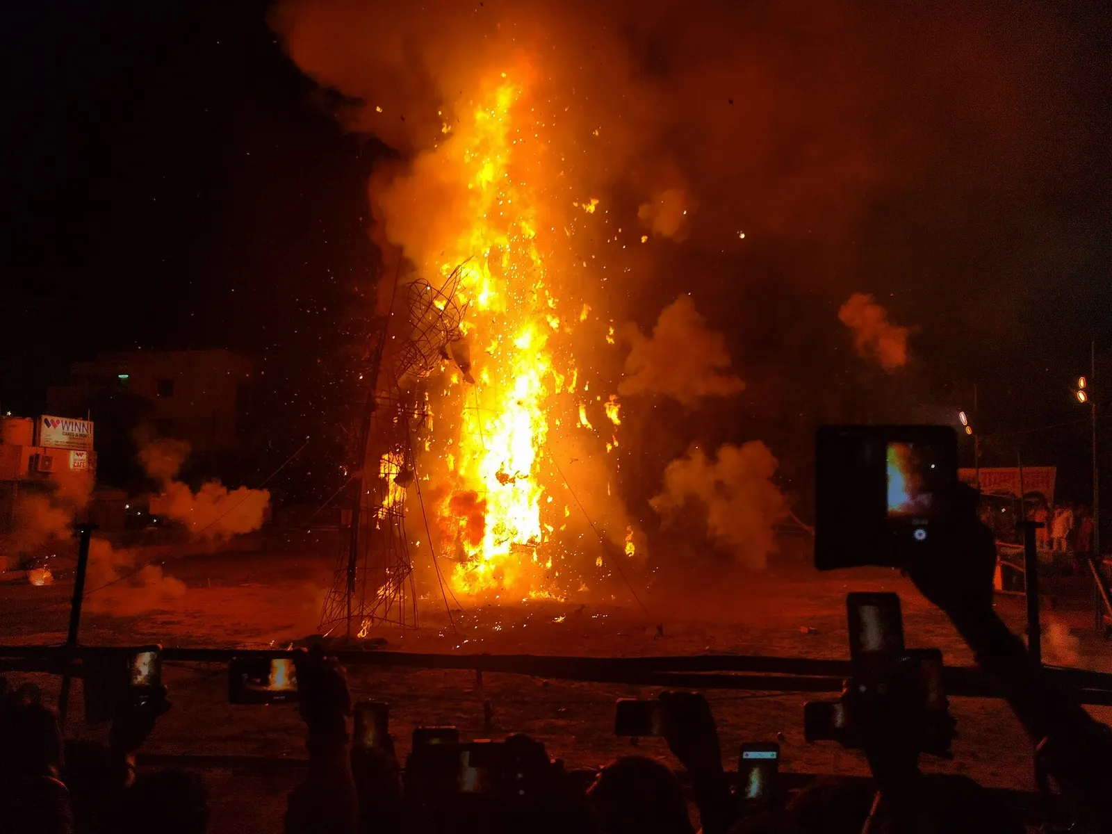 A large Ravan effigy set alight during a Dussehra celebration.