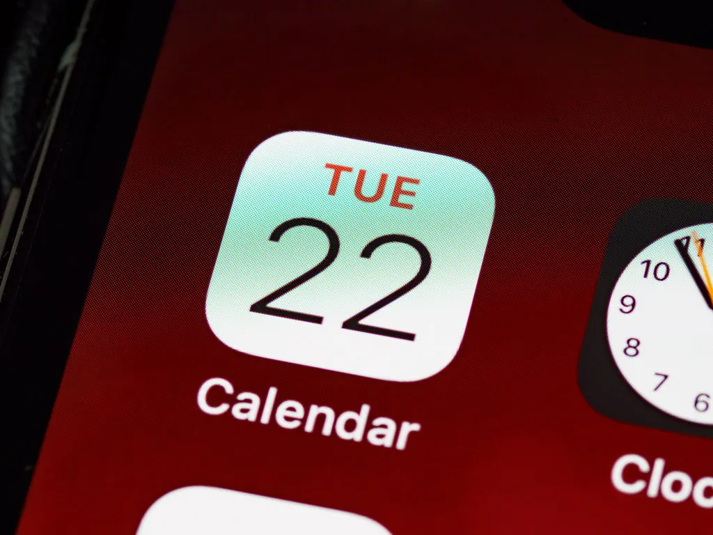 A calendar app open on a phone with festival reminders.