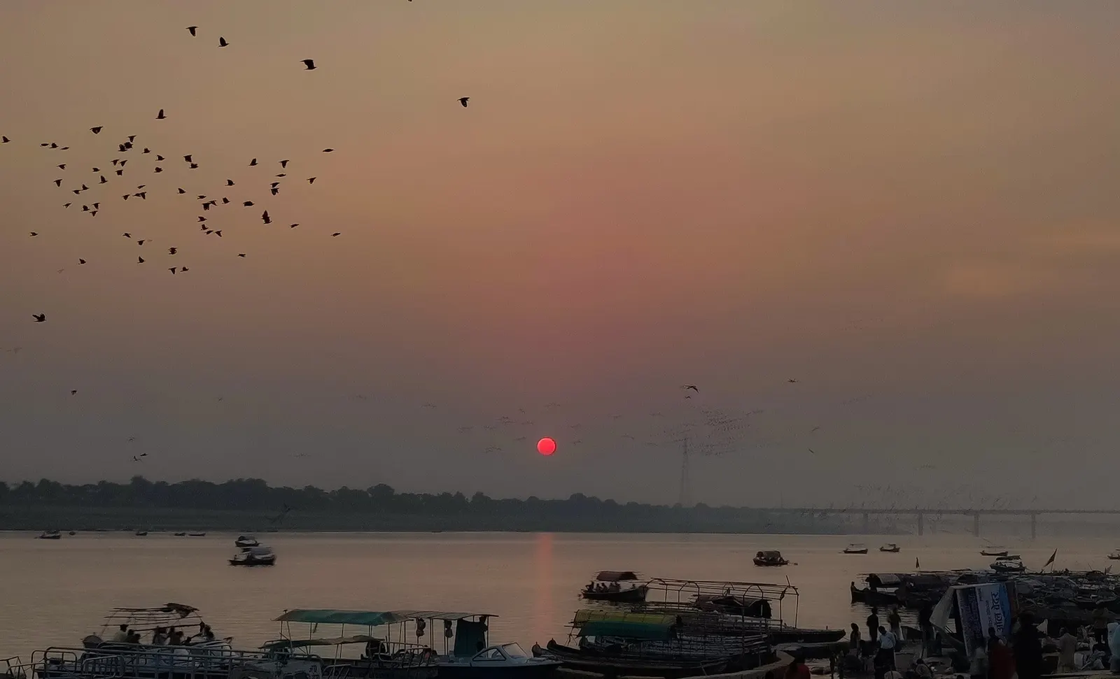 Sunrise light over the river confluence at Prayagraj.