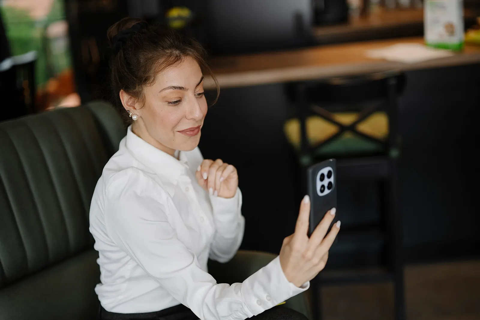 A smartphone screen displaying a live video call in progress.