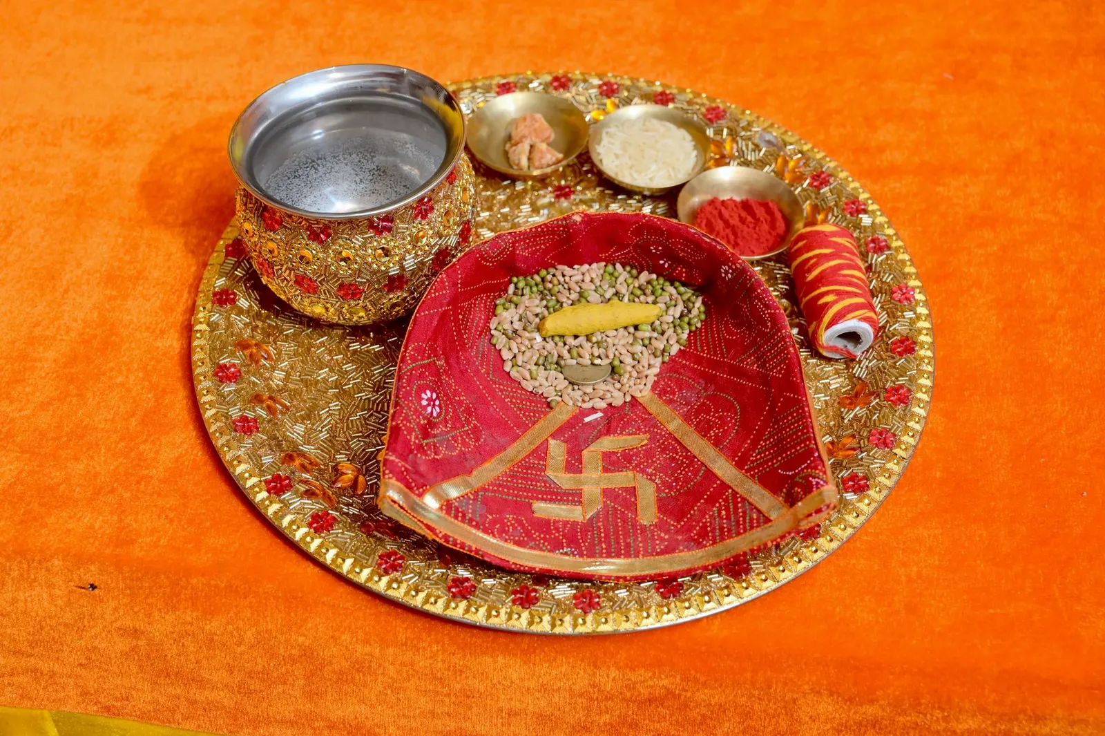 Small bowls of sacred ash and kumkum used for tilak.
